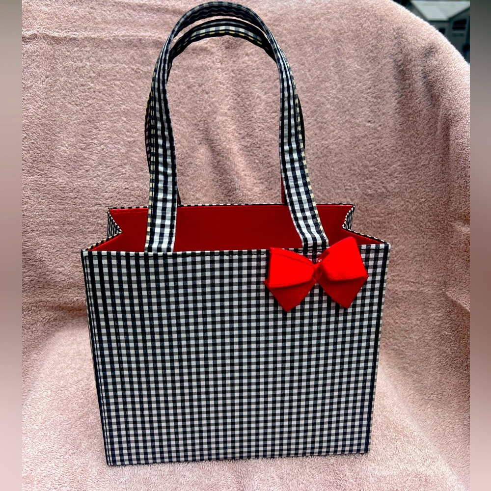 Red silk cloth inside. No rips or tears. Lite yellowing staining on the handles.